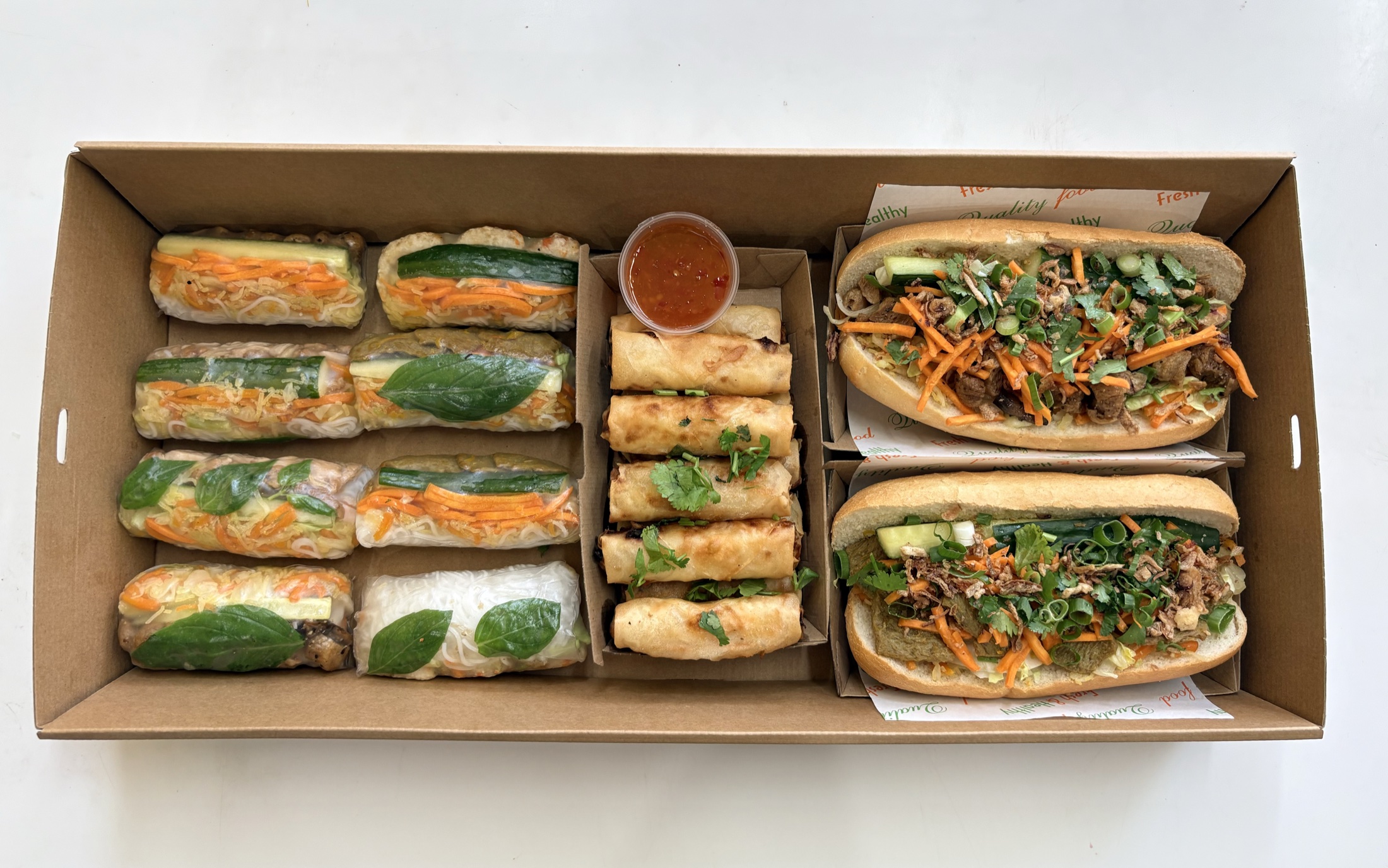 VieVegan catering spread with plant-based Vietnamese dishes