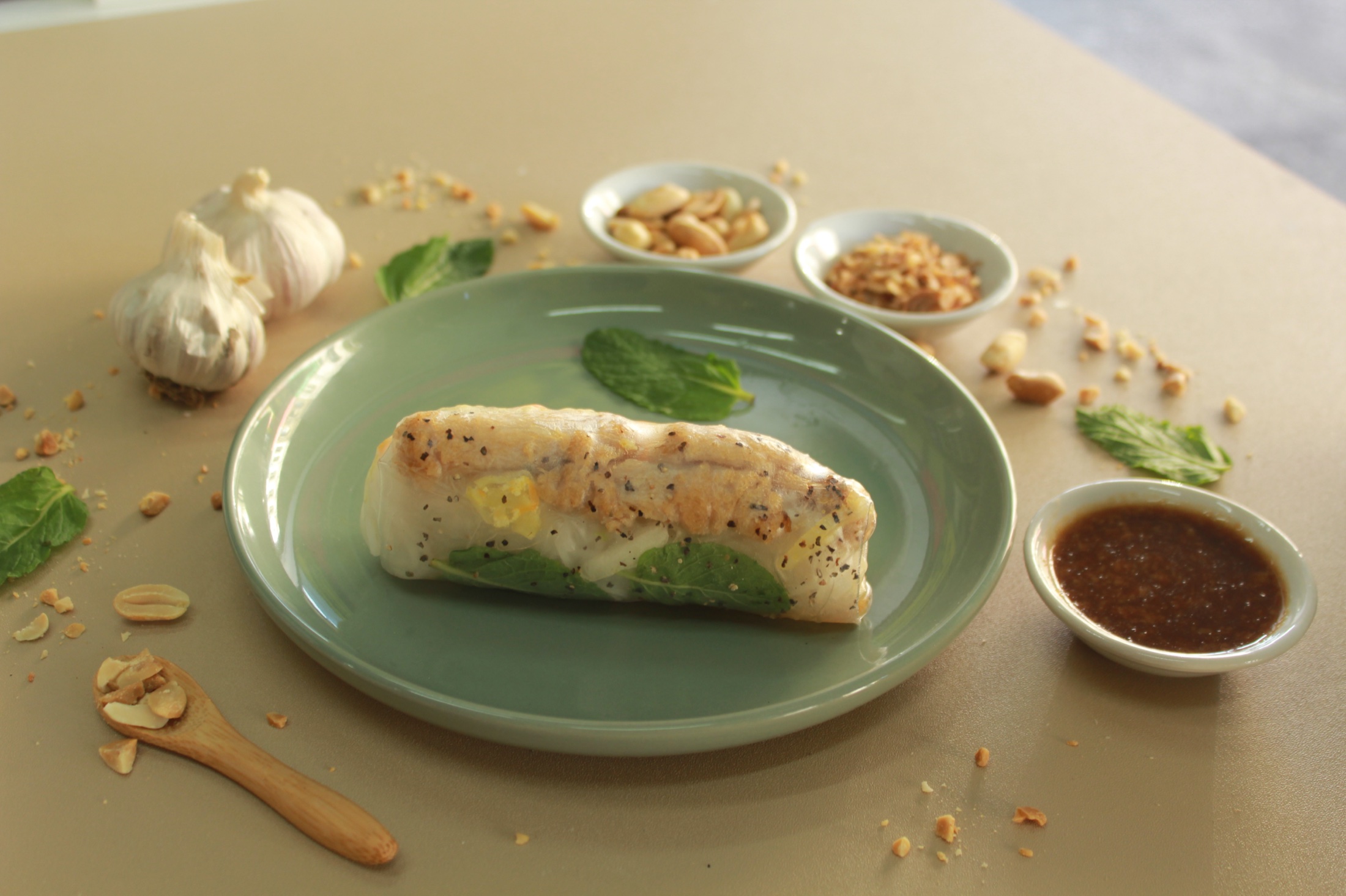 VieVegan rice paper roll with peanut hoisin sauce